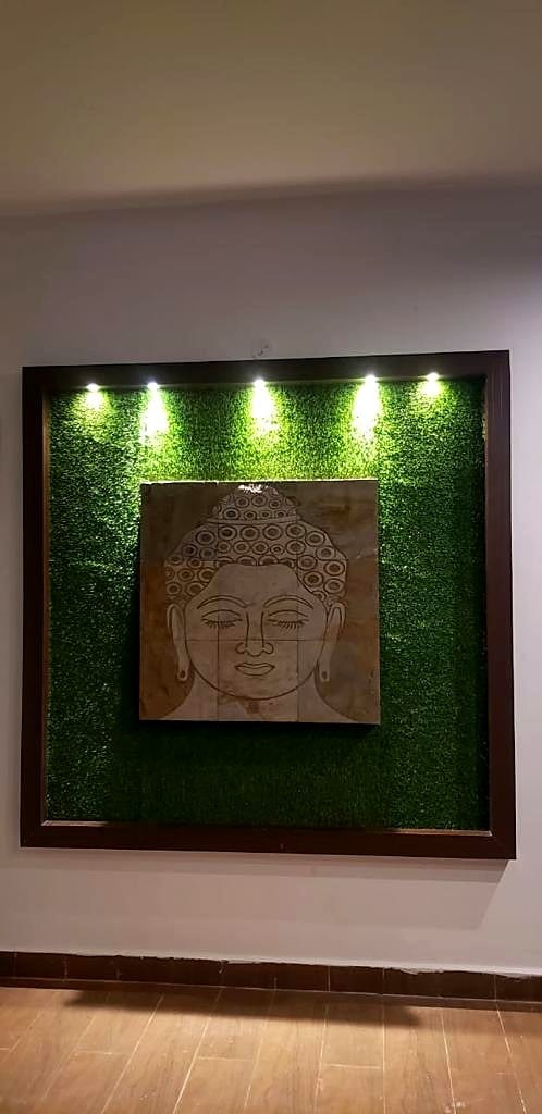 Buddha panel + grass wall