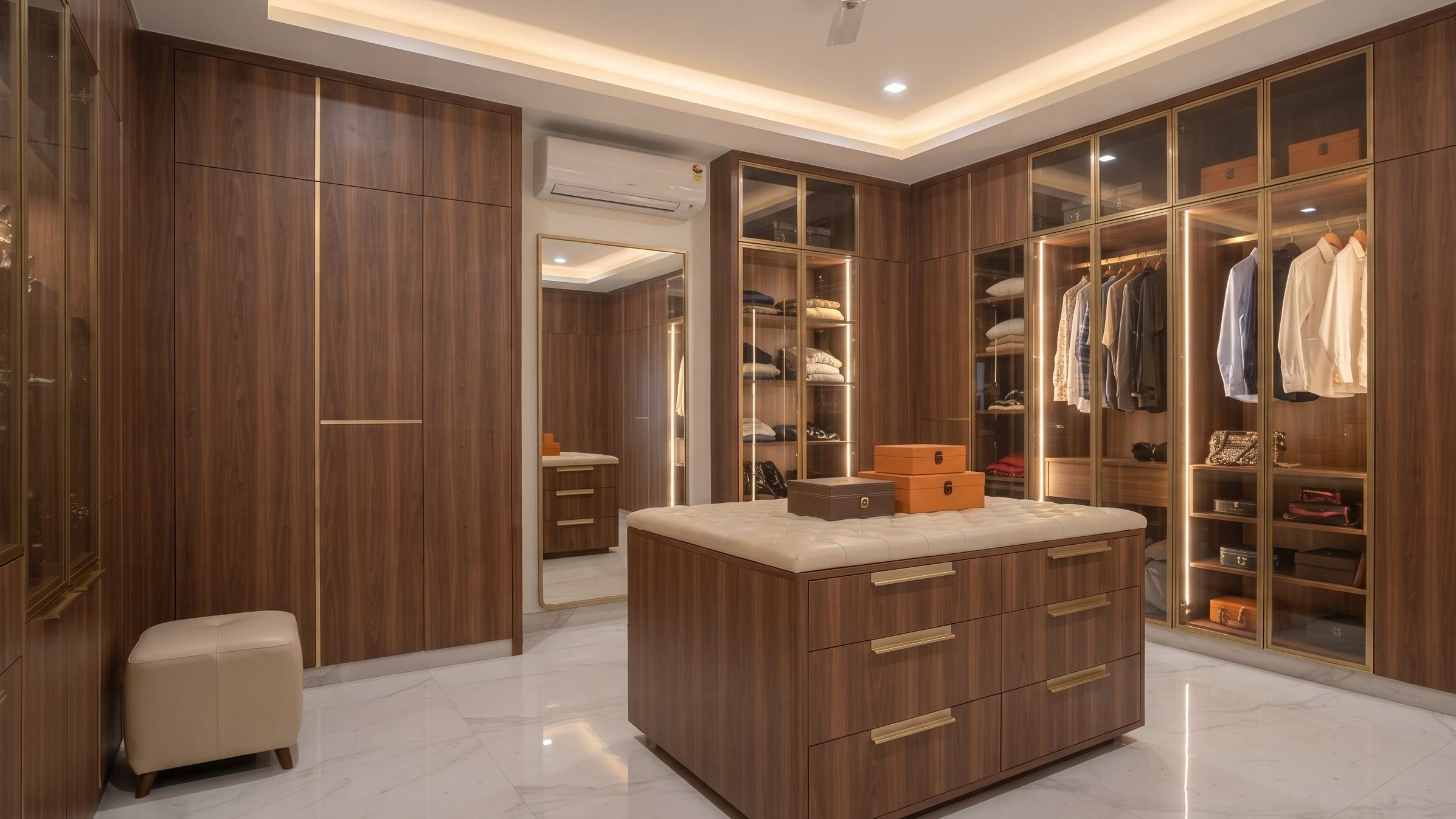 A floor-to-ceiling wardrobe in pale laminate with a fluted glass tall unit